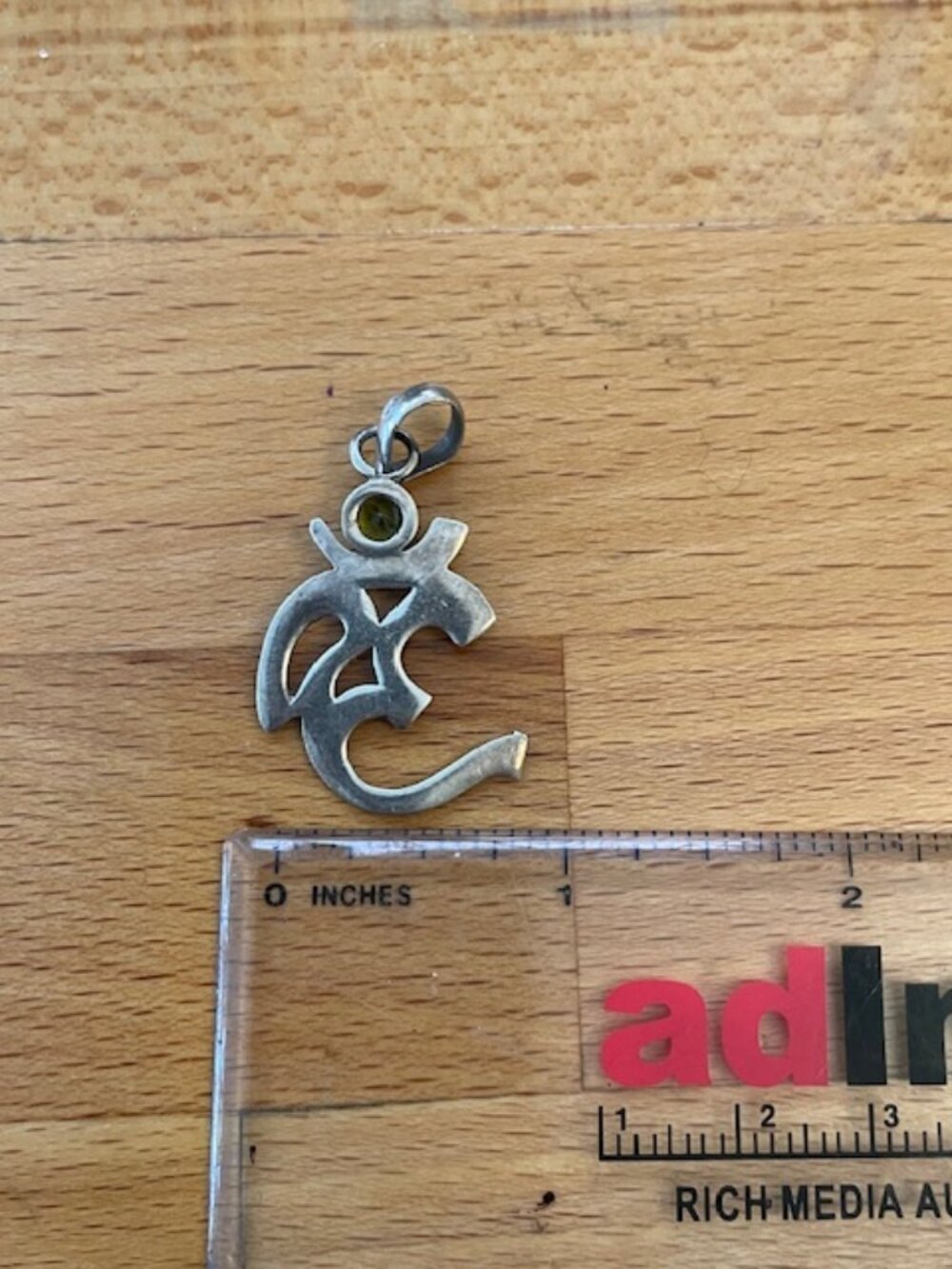 Silver Ohm Pendant with Green Stone - Picture 5 of 6